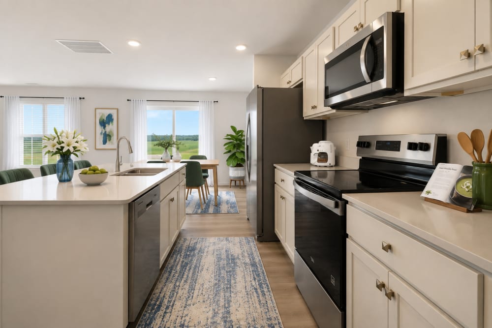Modern kitchen with stainless steel appliances at Brixin Sonora in Fort Wayne, Indiana
