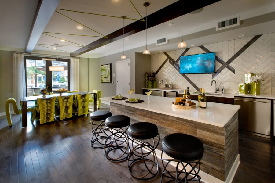 Resident lounge area with great views from the surrounding windows at Reserve at the Ballpark in Atlanta, Georgia