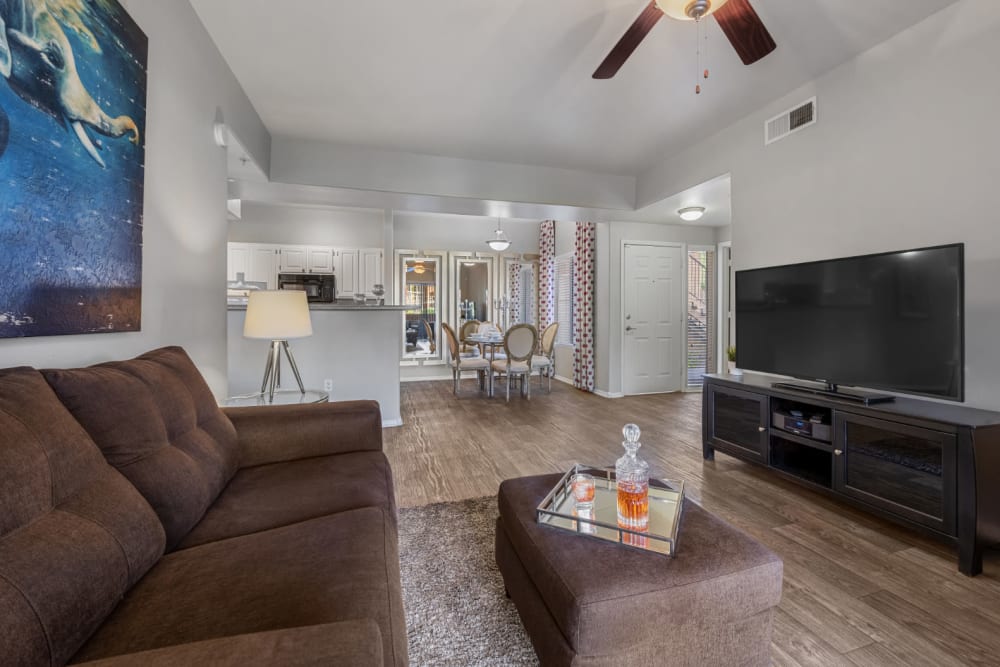 Well-decorated living space with wood style flooring at Alante at the Islands in Chandler, Arizona