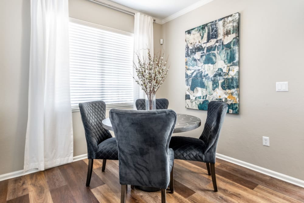 Dining room overlooking the spacious kitchen at The Links at Plum Creek in Castle Rock, Colorado