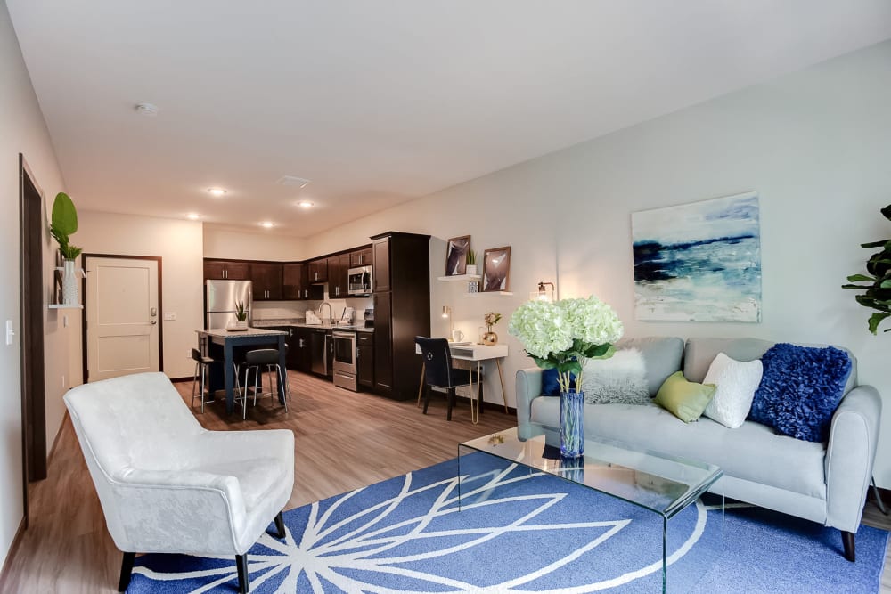 Spacious layout with wood-style flooring at Lake Jonathan Flats in Chaska, Minnesota