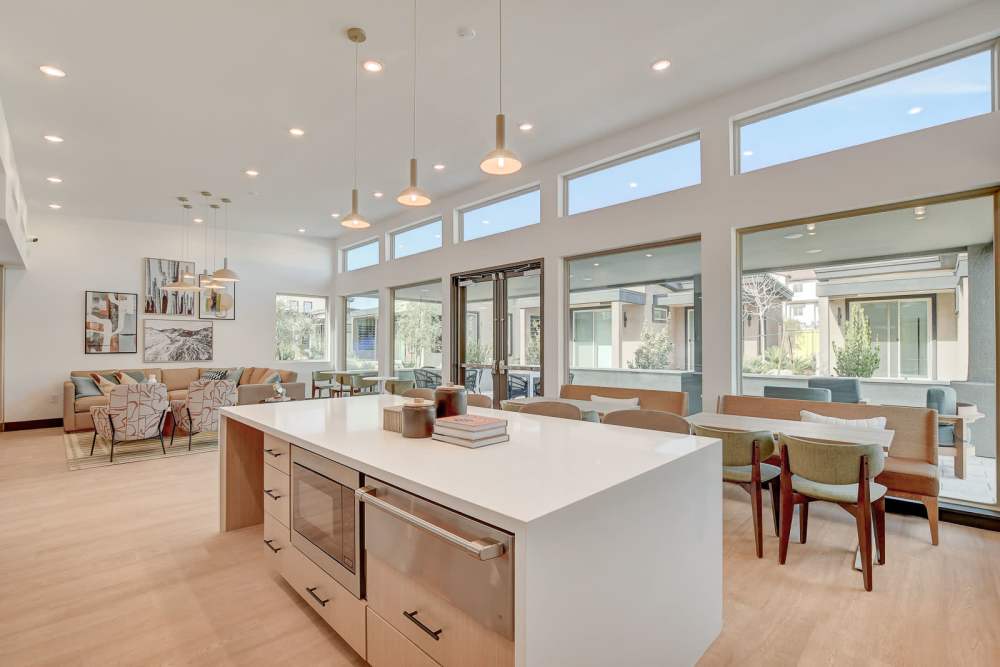 A view of the community dinning area with tables and chairs for sitting at Heirloom at Rome in Las Vegas, Nevada