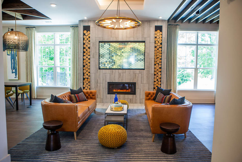 Modern resident clubhouse with a cozy firpelace at Boulders Lakeside in North Chesterfield, Virginia