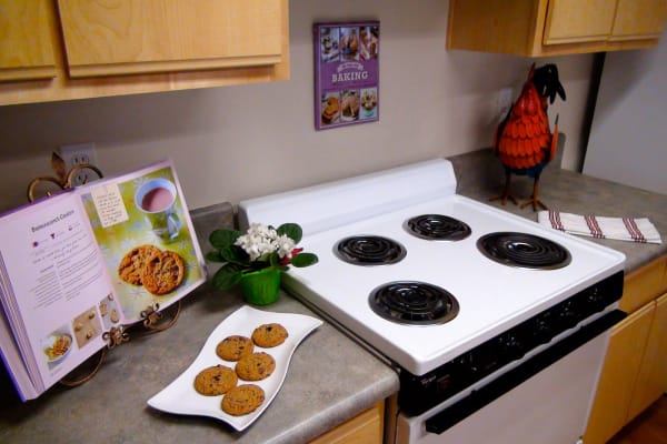 An apartment kitchen at The Cambridge at Bitter Lake in Seattle, Washington