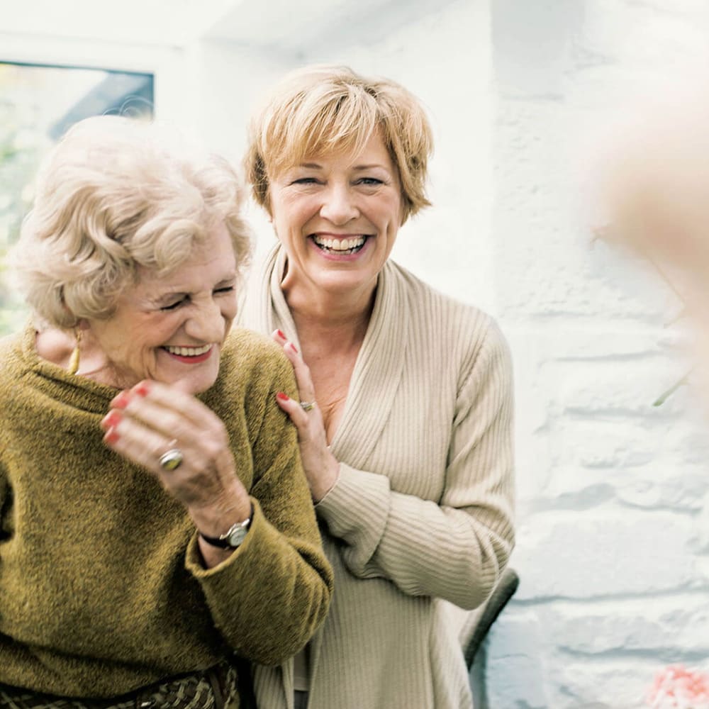 Two residents posing for a photo at Anthology of McCandless in Pittsburgh, Pennsylvania