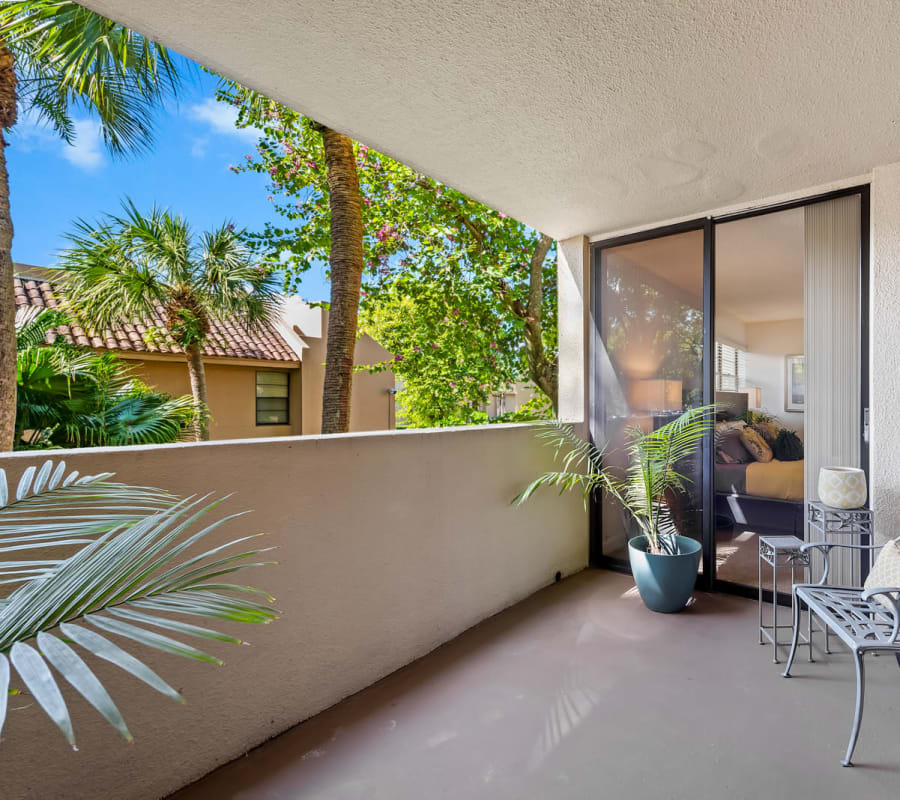 Private patio with a view at Meadow Walk Apartments in Miami Lakes, Florida