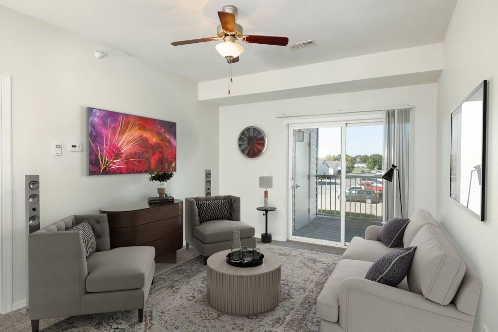 Modern furnishings in the open-concept living area of a model apartment at Regency Apartment Homes in Williston, North Dakota