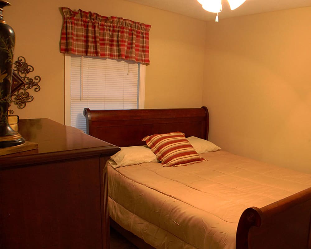 Bedroom with ceiling fan at Northcreek in Phenix City, Alabama