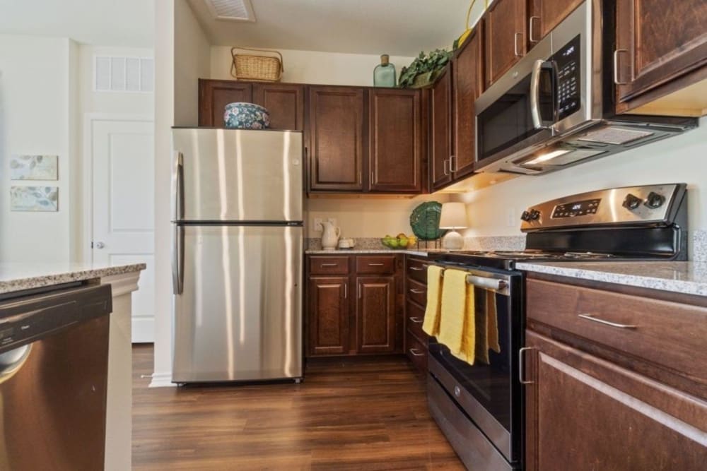 Spacious kitchen with stainless steel appliances at Auberge of Tyler in Tyler, Texas
