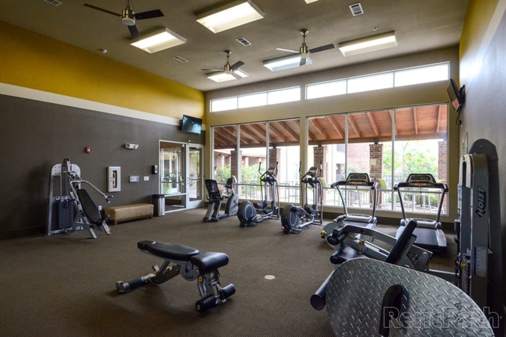 Assortment of exercise machines in the fitness center at The BLVD in San Angelo, Texas