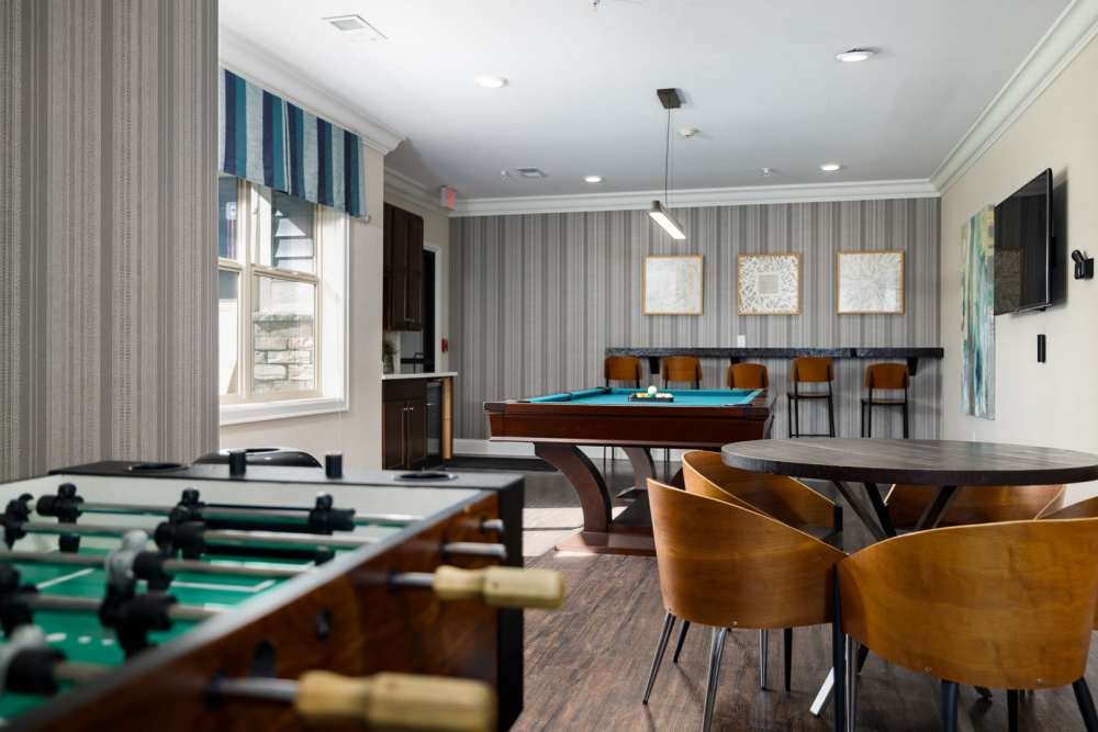 Game room with foosball at University Commons in Williston, North Dakota