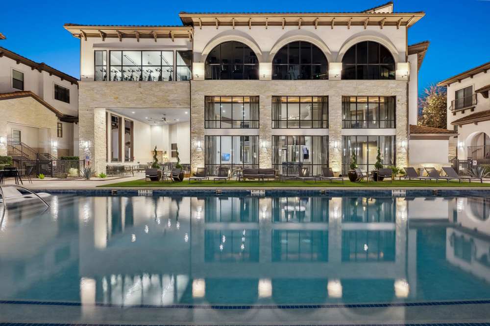 Pool with view of clubhouse building at Domain Memorial in Houston, Texas