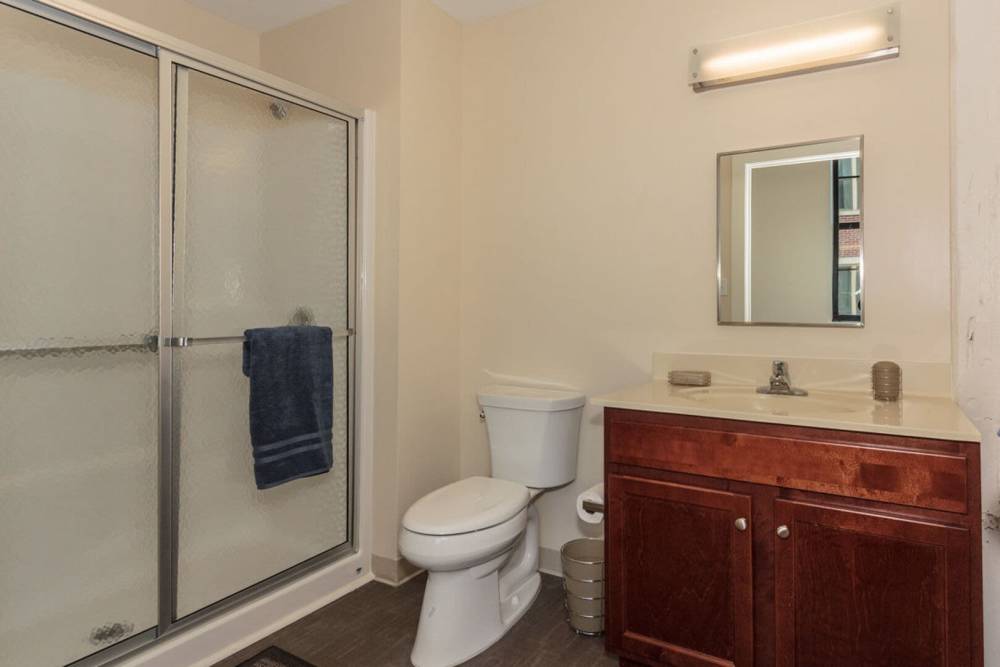 Bathroom in a studio apartment at Pleasant Street Apartments in Beverly, Massachusetts