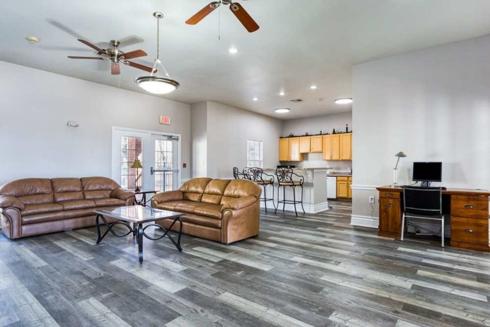 Community clubhouse with kitchen at Boomer Creek Apartments in Stillwater, Oklahoma