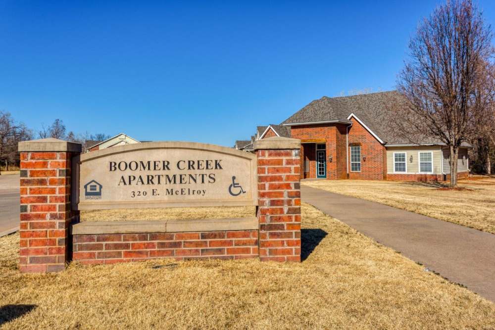 Community signage at Boomer Creek Apartments in Stillwater, Oklahoma