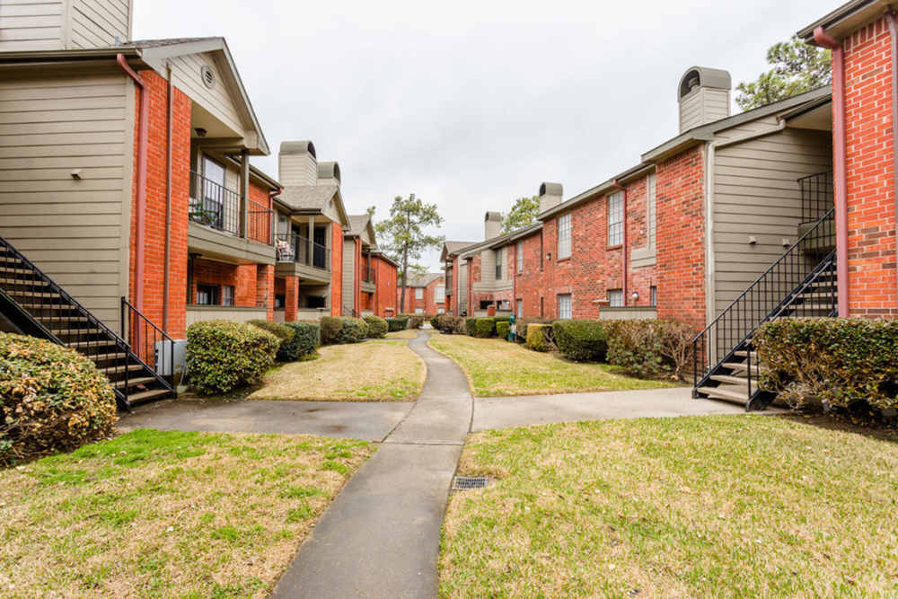 An apartment featuring stairs at Green Tree Place in Houston, Texas