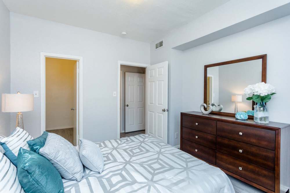 Bedroom with walk-in closet at Green Tree Place in Houston, Texas