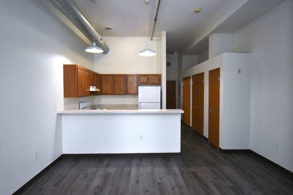 Wooden doors along the wall at Straus Lofts in Saint Paul, Minnesota