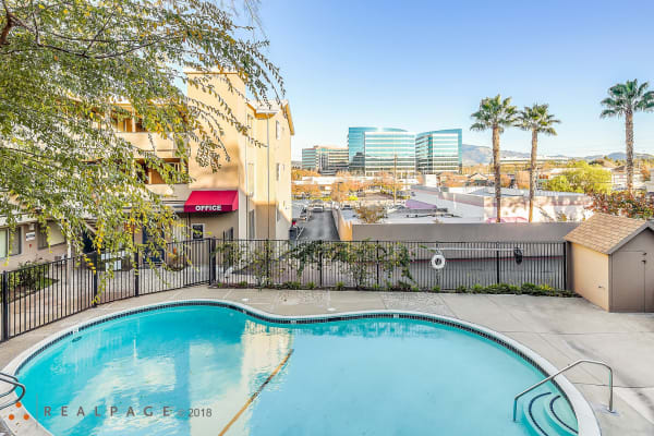 Swimming pool with view of city at North Main in Walnut Creek, California