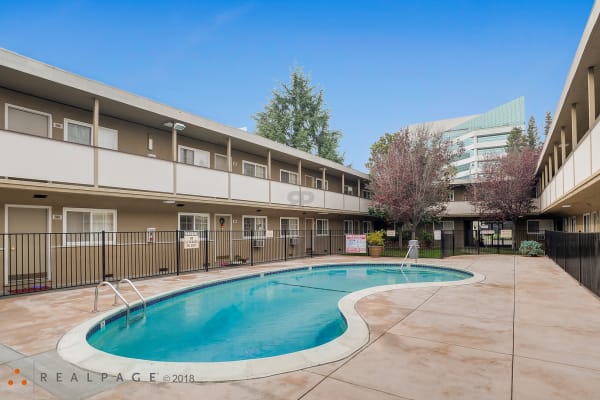 Inviting outdoor swimming pool at City Walk Apartments in Concord, California