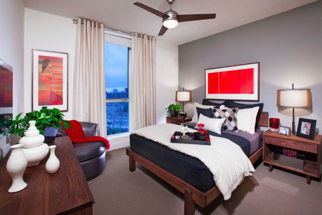 Furnished bedroom at The Marke Apartment Homes, Santa Ana, California
