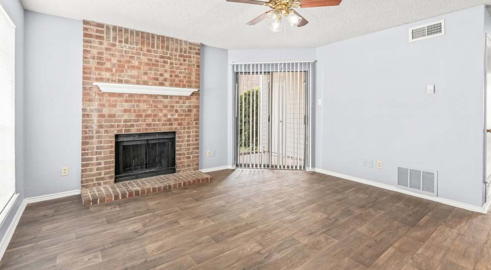 Living area with fireplace at North Hills Place in Richland Hills, Texas