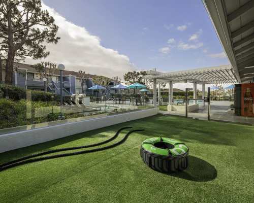 Outdoor fitness lawn at Pacific Pointe Apartment Homes, San Clemente, California