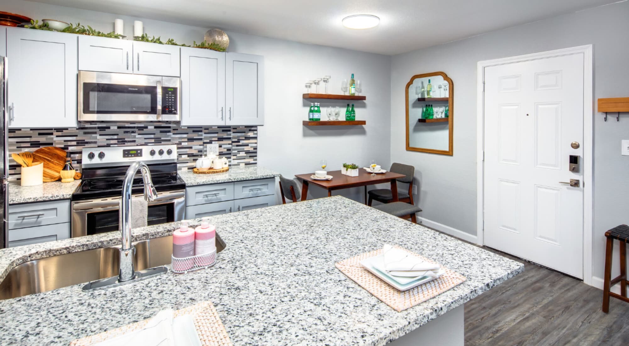 Kitchen with stainless-steel appliances at Melrose in Houston, Texas