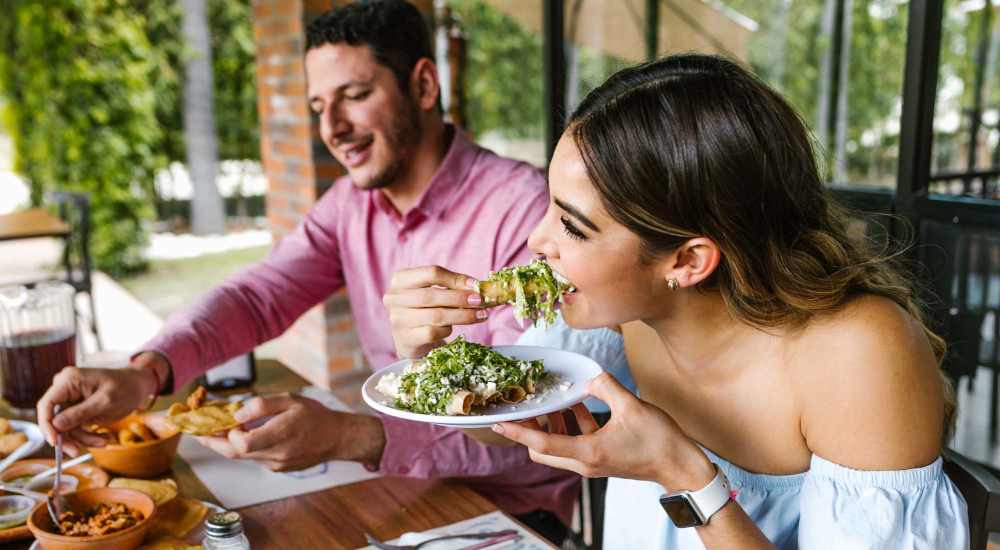 Residents having delicious food at a restaurant near Arbors of Taylor in Taylor, Texas