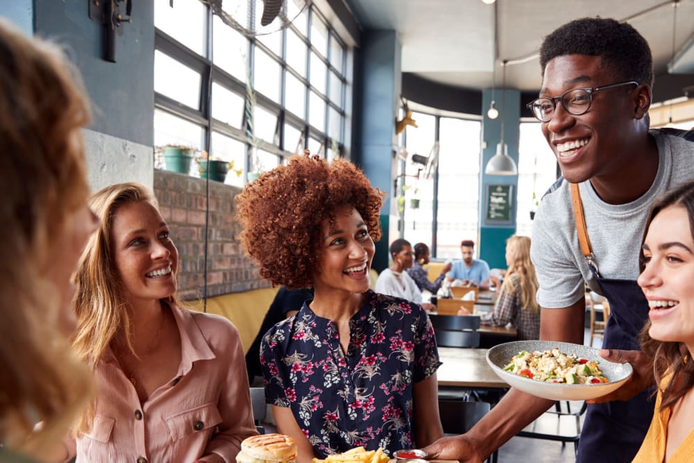 Friends enjoying a lunch together near in Memphis, Tennessee near Waterview Apartment Homes