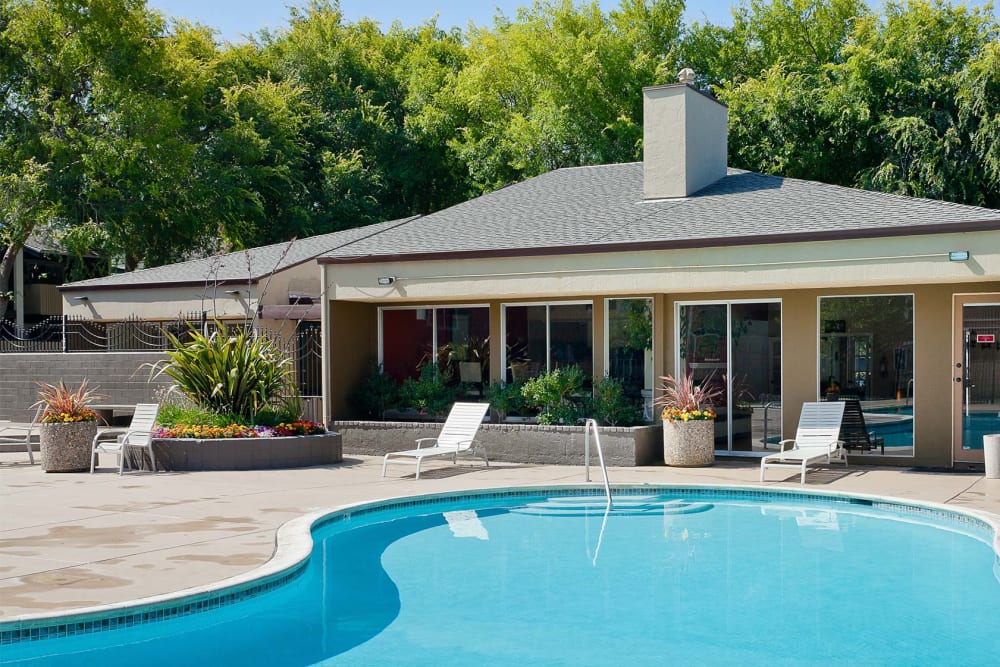 Sunny pool and lounge chairs at Bidwell Park Fremont in Fremont, California