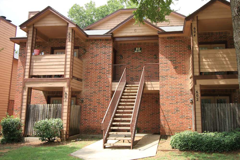 Building exterior with stairs at Stadium West Apartments in Arlington,Texas