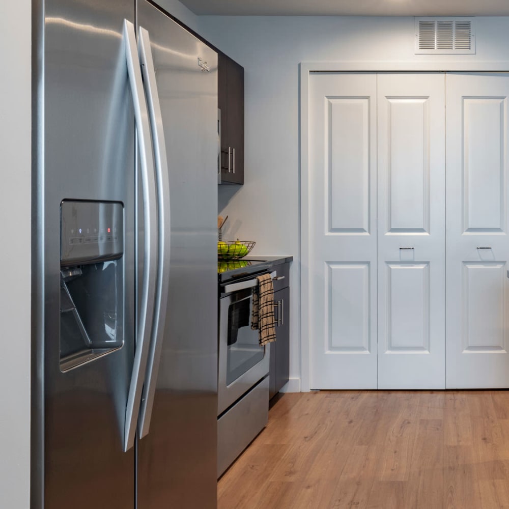 Stainless-steel appliances in a model apartment's modern kitchen at CitiTower in Orlando, Florida