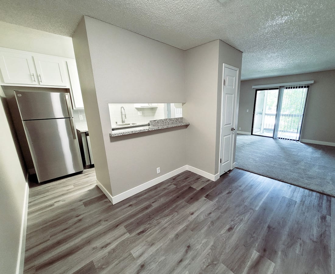 Living space with wood-style floors at  The Mews At Dixon Farms in Dixon, California