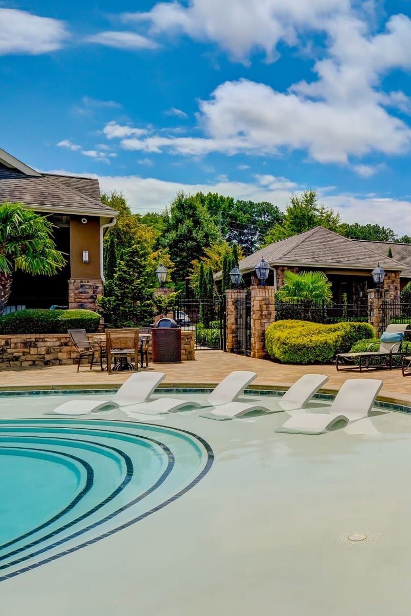 Poolside veranda at Estates at McDonough Apartment Homes on a sunny spring day in McDonough, Georgia