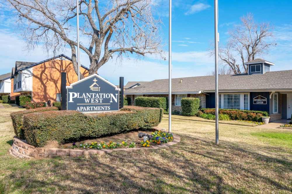 Community view with signage at Plantation West in Hurst, Texas