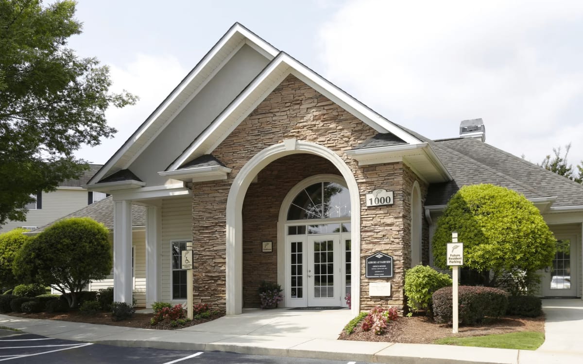Exterior view of the community building at Arbors at Fairview Apartments in Simpsonville, South Carolina