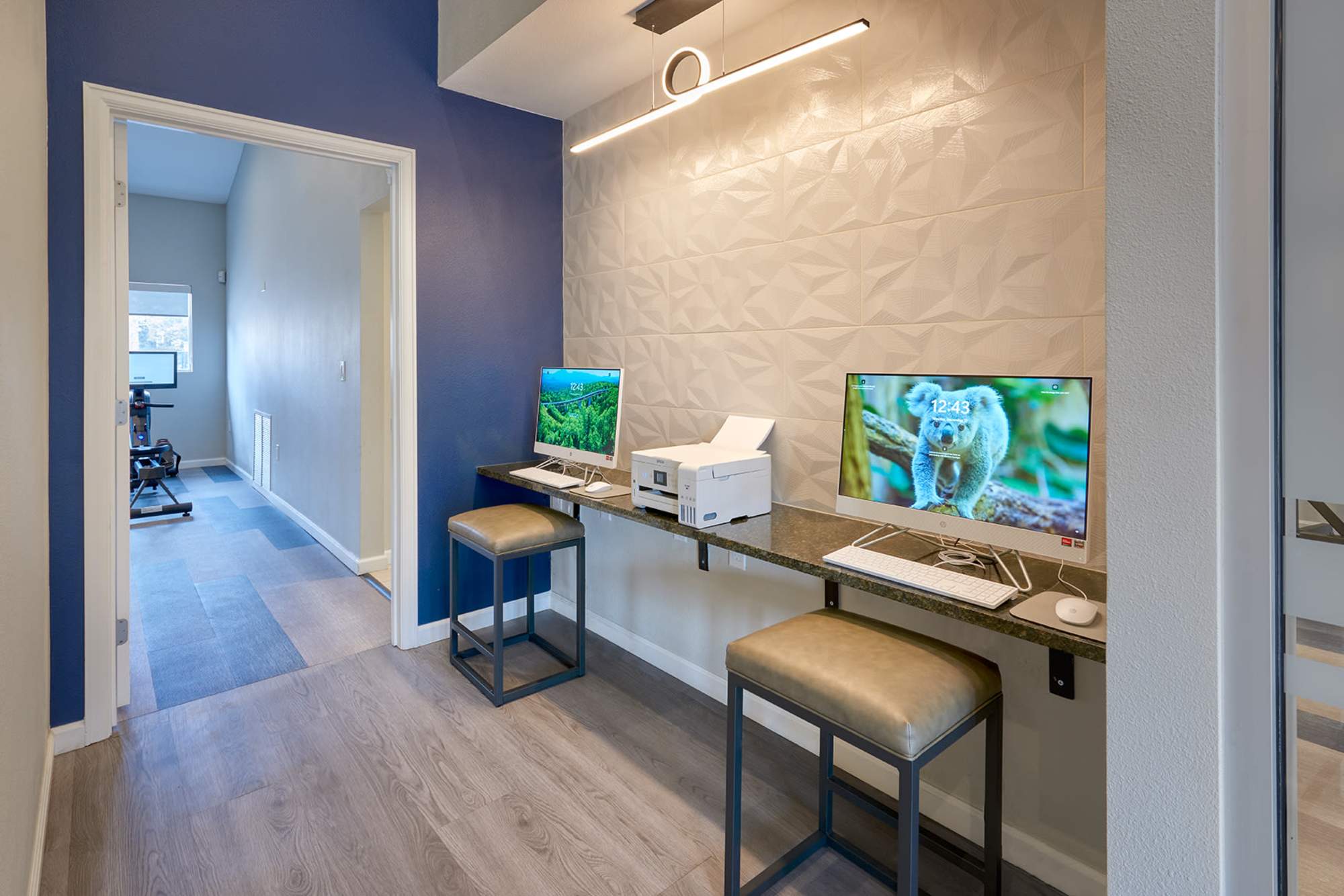 Business Center in Clubhouse of Alton Green Apartments on a sunny day in Denver, Colorado