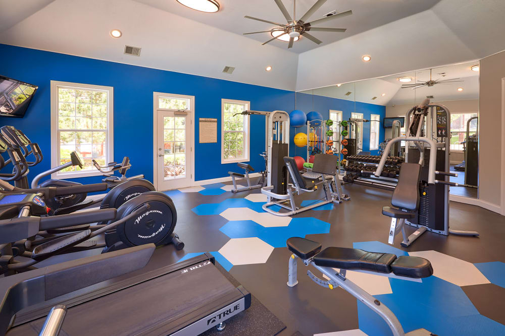 Fitness center with plenty of individual workout stations at Skyecrest Apartments in Lakewood, Colorado