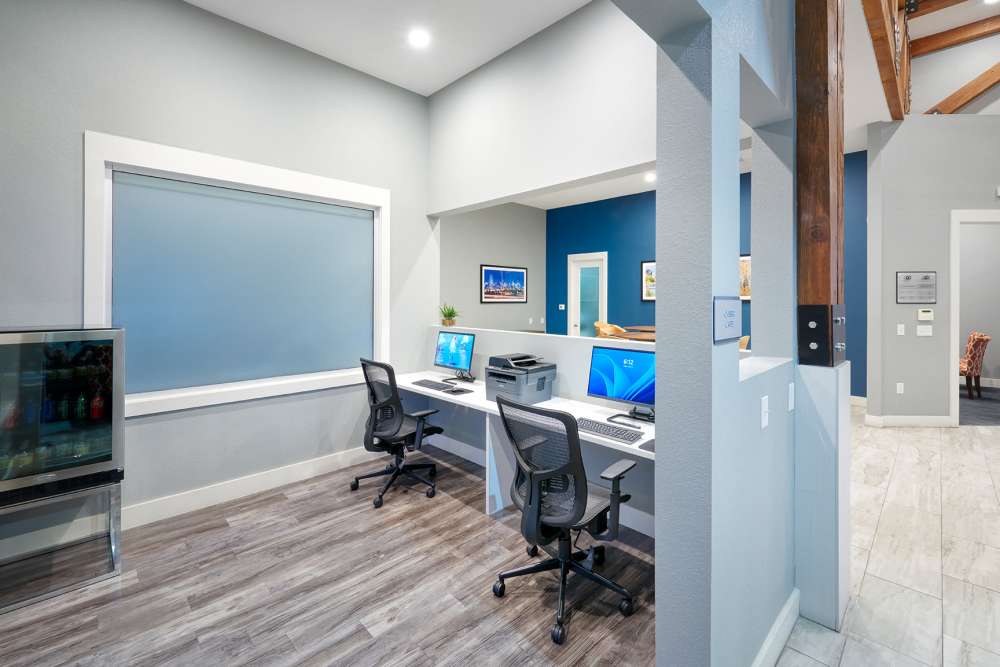 Community workstation area at Crestone Apartments in Aurora,Colorado