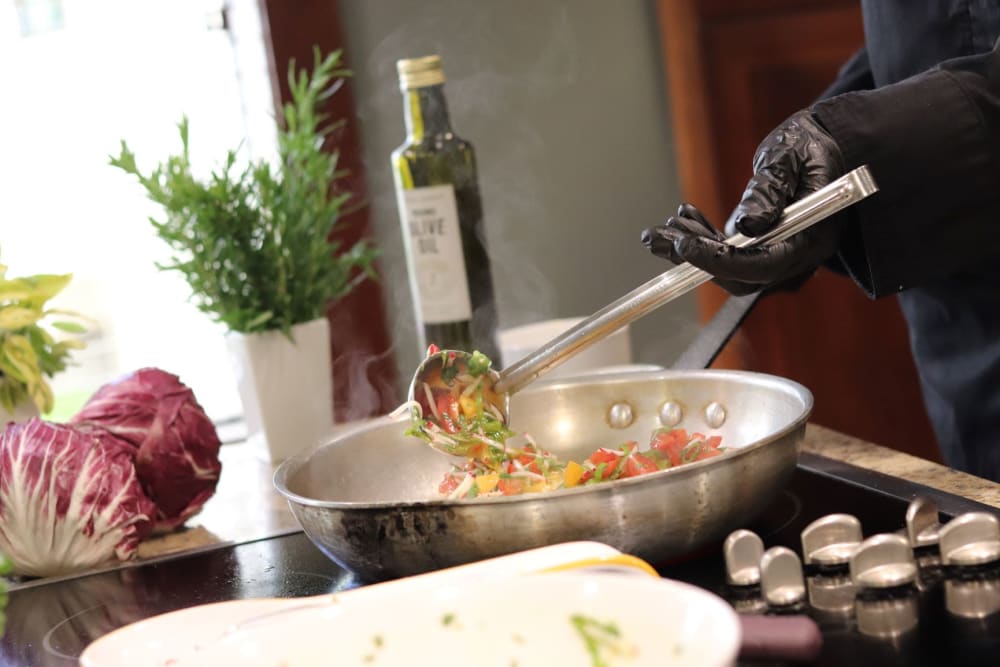 Chef prepares delicious meal at The Springs at Carman Oaks in Lake Oswego, Oregon