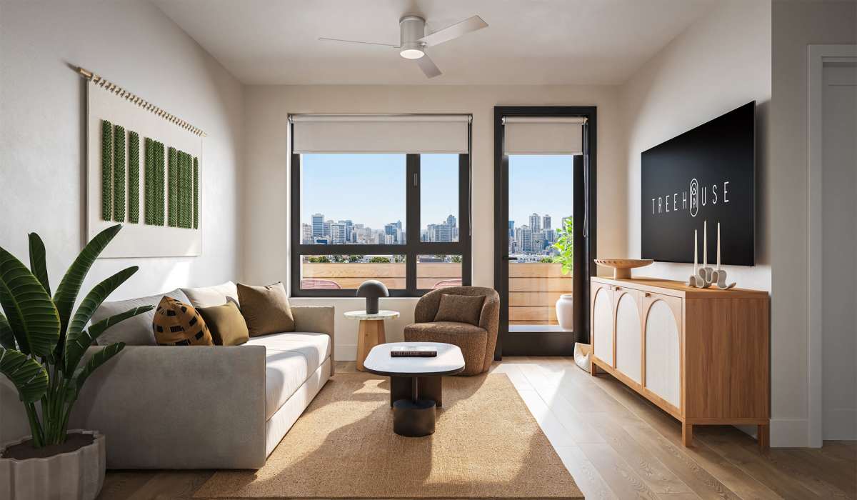 Spacious living room with natural lighting at Treehouse in San Diego, California