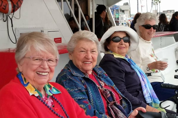 Resident friends on an outing near Merrill Gardens at Huntington Beach in Huntington Beach, California. 