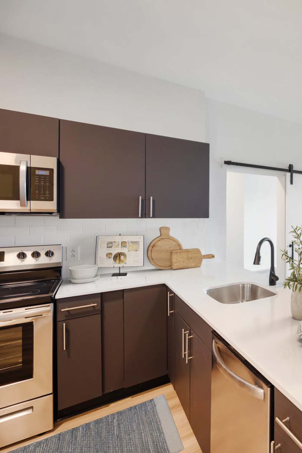 A view of the kitchen at The Residences at Justison Landing in Wilmington, Delaware