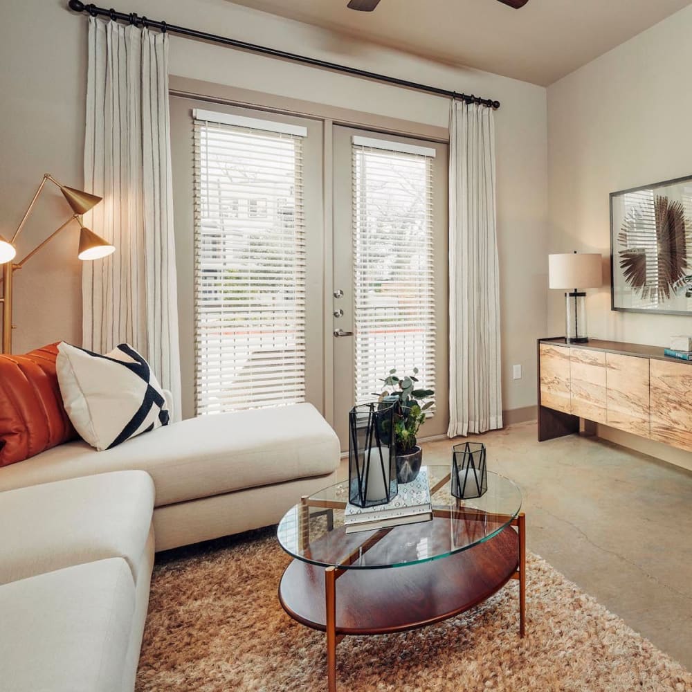 Modern furnishings in the living area of a model home at The Guthrie in Austin, Texas