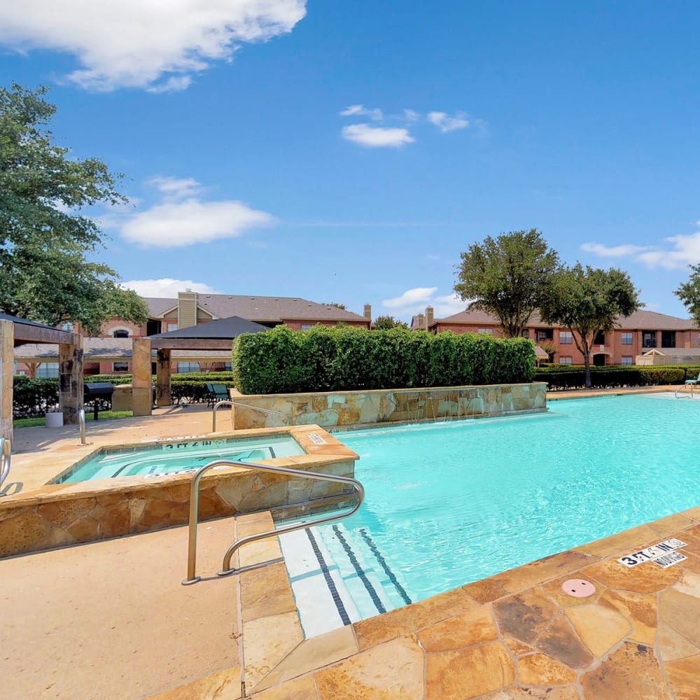 Spa overlooking the pool at Oaks Riverchase in Coppell, Texas