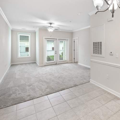 Apartment entryway leading into open living space at Brittany Place Hendersonville in Henderson, North Carolina