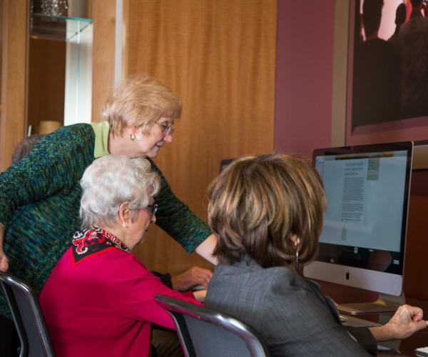 Residents brushing up on their computer skills at All Seasons of Birmingham in Birmingham, Michigan