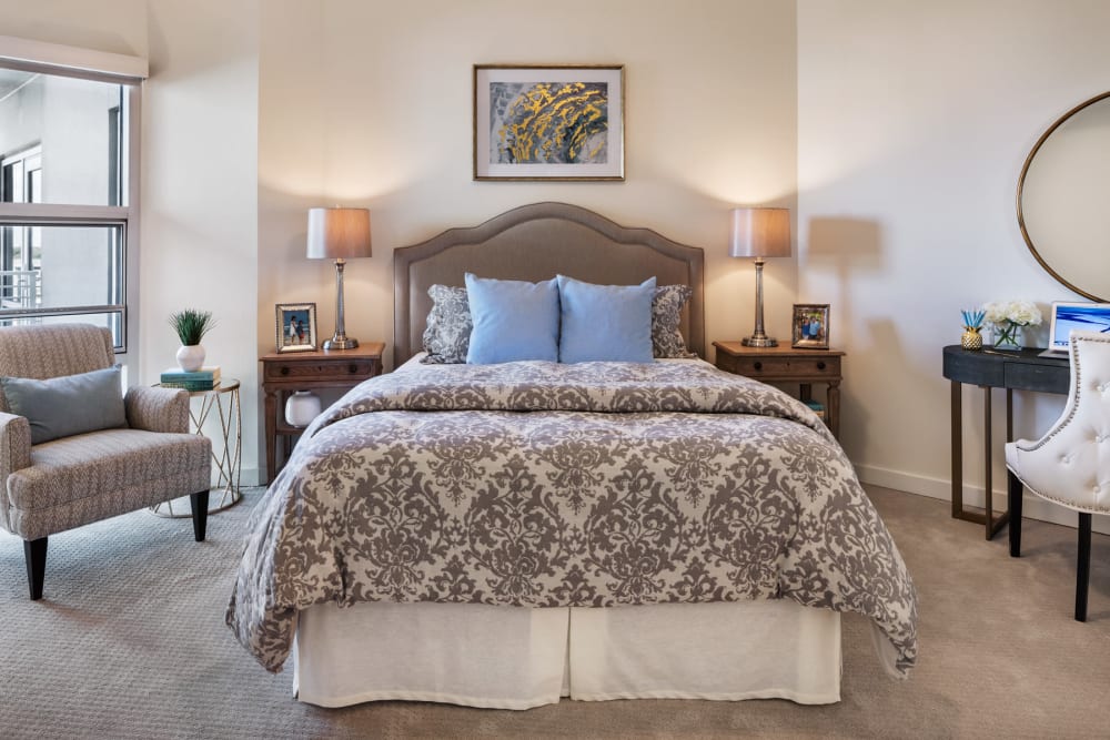 A decorated apartment bedroom at The Village at The Triangle in Austin, Texas