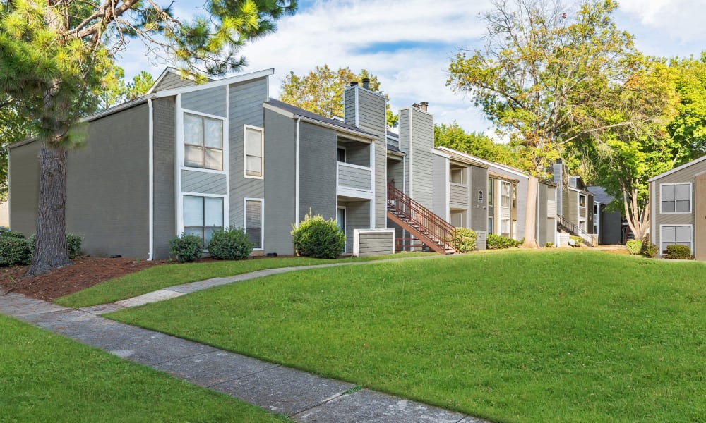 cement walkways beset by lush lawns at The Beacon in Huntsville, Alabama